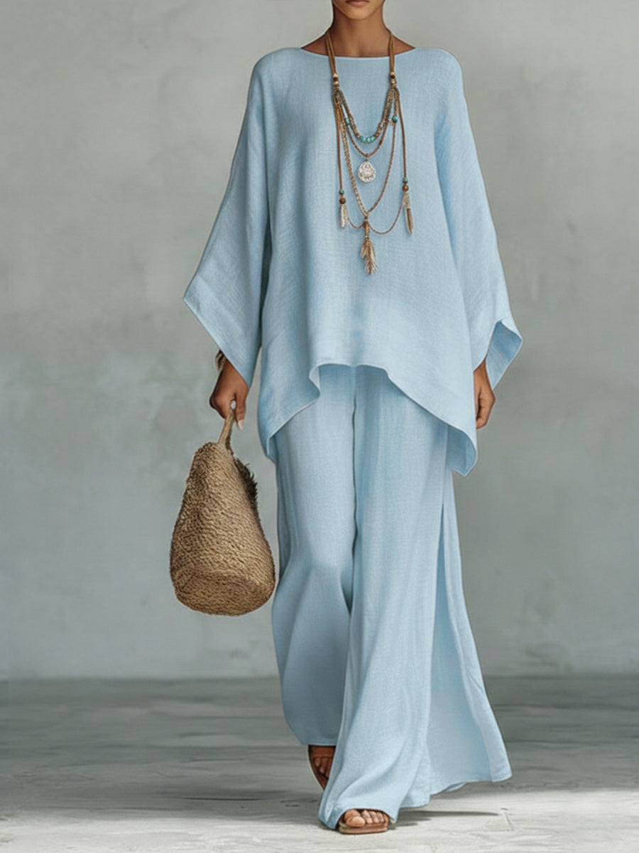 Ensemble deux pièces en lin et coton pour femmes, confortable et ample, avec top et pantalon à jambes larges.